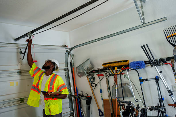 Professional Garage Door Panel Replacement technician working in Penn State Erie, PA